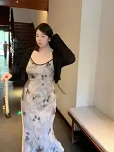 着回しに便利な黒いニットカーディガン【短丈・ルーズフィット・大サイズ・国風】