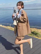 洗練された印象の女性用スーツ【春秋向け・ショートスカート・2点セットアップ対応】