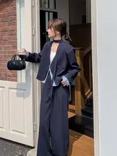 個性的なデザインのダークブルー スーツ風 ワイドパンツ（セットアップ対応）
