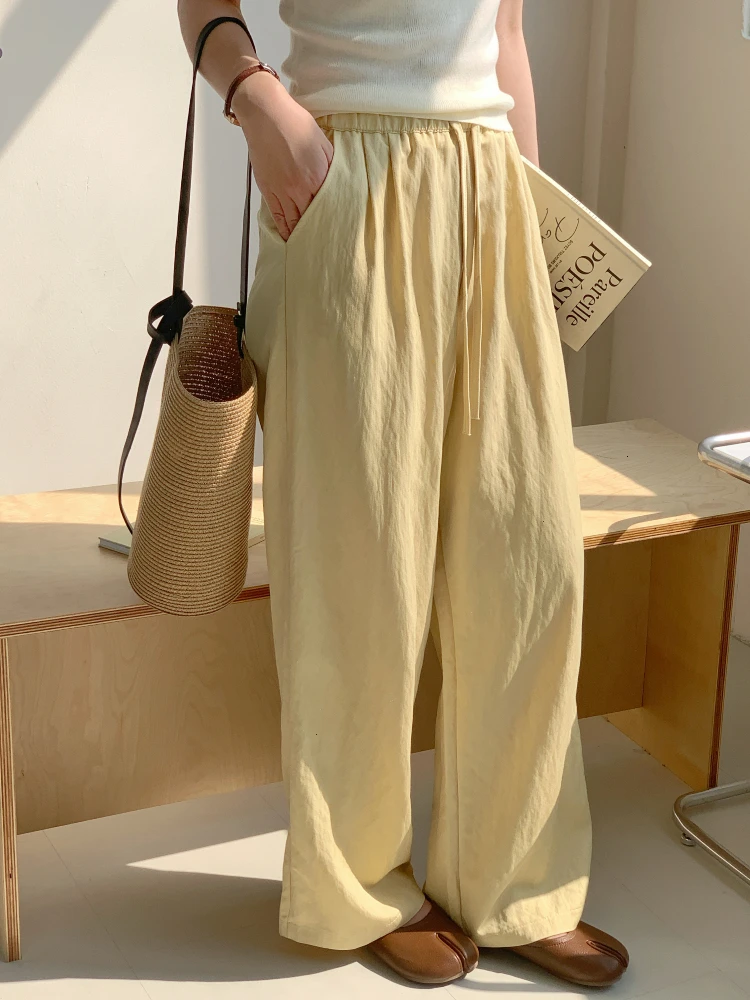 白色ゆったりカジュアルハイウエストワイドパンツ：夏用の通気性と百搭性を実証
