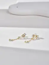 白色の淡水真珠イヤリング【シンプルでモダンなデザイン・マントウ型】