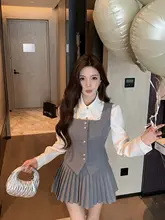学院風の甘美なデザイン！女性用フリルスカートとベストの春季向けコーディネート（セットアップ対応）