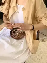 春のトレンド！明るい黄色のゆったり長袖シャツ【韓国風・ミニマルデザイン・カジュアルコーデ】
