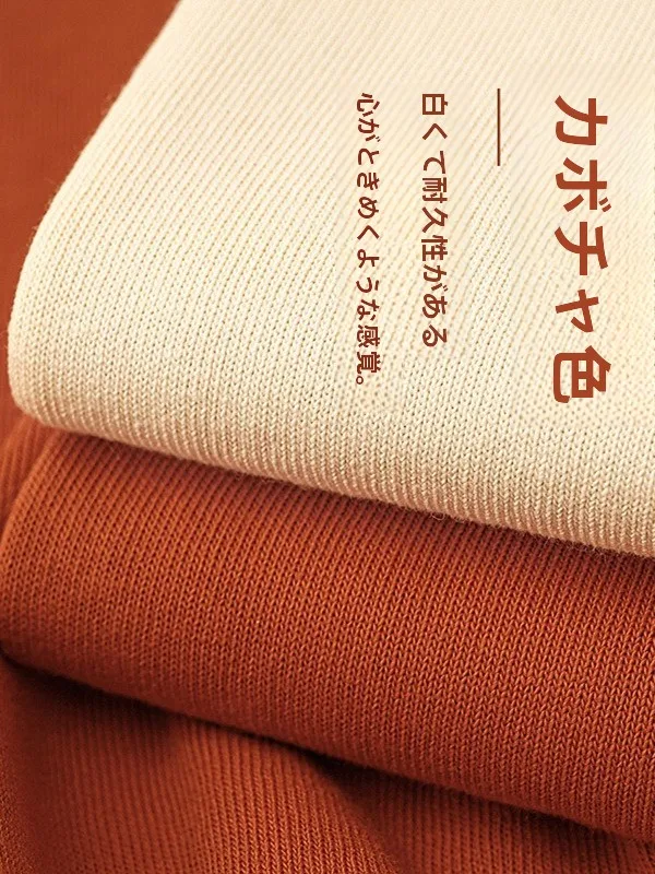 南瓜色のラウンドネックTシャツで中着を着る：通気性と暖かさのバランスを実現