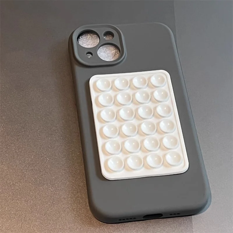 カップ型シリコンスマホスタンド：カップル向けの吸盤式スタンドが実用性を提供