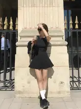 韓国デザインの無地フリルノースリーブトップスとスカートのファッションコンビネーション（セットアップ対応）