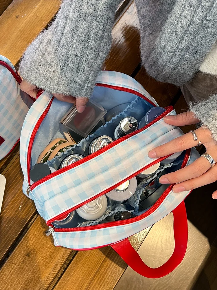 大容量女性用化粧ポーチ：防水・収納分区で旅行や日常通勤に最適な設計