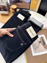 刺繍入りリボンデザインのデニムパンツ【女性用・スリムフィット・九分丈・秋春向け】