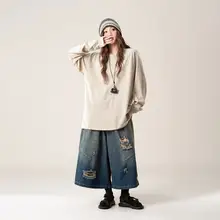 リラクシングデザインのオフショルダー長袖Tシャツ【杏色・ゆったりシルエット・春用】