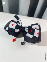 個性的なブラック＆ホワイトチェッカーボードデザインのサテン蝶ネクタイ【男女兼用・フォーマル用】