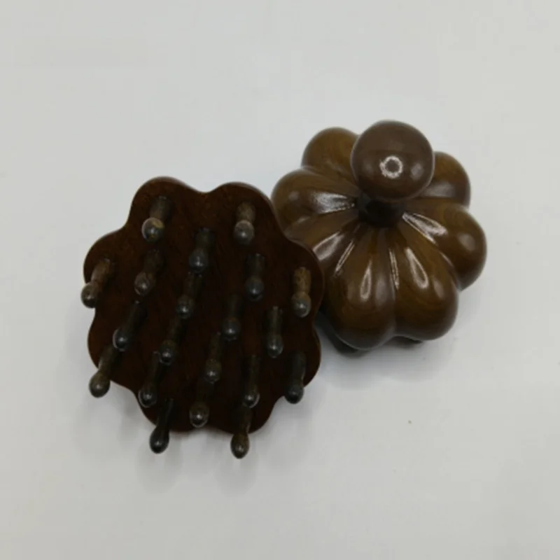 背中ツボマッサージで腰痛を和らげるには、どんなアイテムが最適？