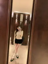 春のスタイルにピッタリ！杏色のダイヤ柄ニットセーター【フロントボタン・長袖】（セットアップ 対応）
