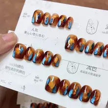 流れる色合いのブルー・ブラウン・アンバー手作りキャラメル猫目ネイル【秋冬・短め・高級感】