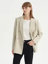 通勤に最適！ゆったりとしたシルエットの女性用スーツジャケット【細身効果・小柄向け】