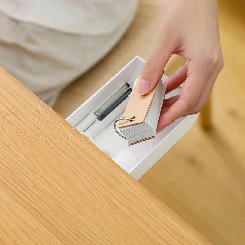 デスク下に貼り付けられる引き出し式ペン立て【隠し収納・文房具用】の効果と使い方