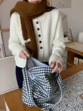 ツイストニットカーディガン 女性 秋冬 新作 ゆったり スラントボタン おしゃれ ニット アウター コーディネートしやすい