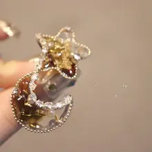 星と月のデザインの高級感あるジルコニア不対称ブラウンイヤリング【イヤーカフ付き】