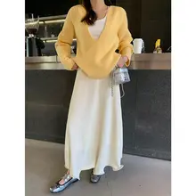 白色の不規則シルエットの巻き裾長スカート【スリムフィット・フレアデザイン】