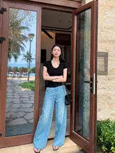 ブルーのワイドレッグデニムパンツ【ハイウエスト・フリンジ仕上げ・ストレート】