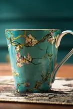 北欧デザインの陶器製マグカップ【骨瓷製・杏の花デザイン・家庭用・カフェにも最適】