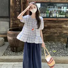 大きいサイズ レディース 夏用 ゆったりした丸首チェック柄ブラウスとワイドパンツの組み合わせ（セットアップ対応）