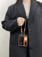 秋冬向けキャラデザインのカラメル色スマートフォンケース【折りたたみ式・防落下・個性的】
