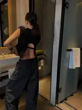 迎春100羊毛製のアシンメトリックニットベスト【バックタイデザイン】