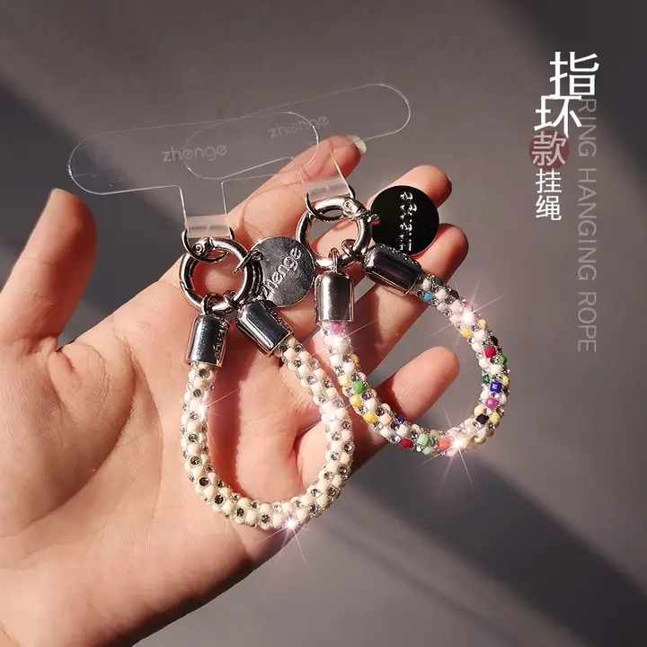 ミニスワロフスキー付きスマホストラップ【高級感のあるデザイン・指輪型短掛け・防盗・精緻な飾り】