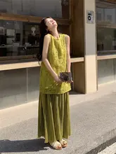 流行の流れを感じる！緑のノースリーブワンピース【トレンド・夏用・リゾートスタイル】