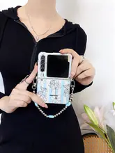 スタイリッシュな青ストライプの花柄折りたたみ式スマホケース【スリングストラップ付き・対応機種多数】（セットアップ対応）