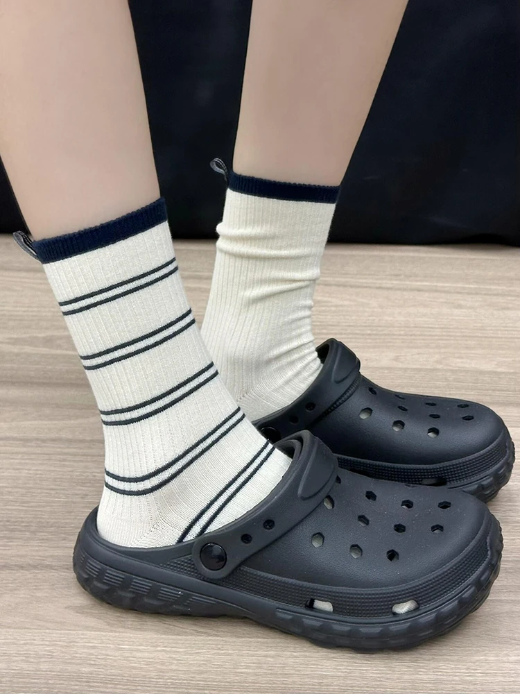 ストライプテーパードアンクルパンツ：大学スタイルのすっきりデザインが春秋に最適な理由