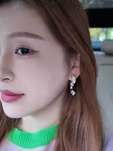 ドラゴンモチーフの中国風イヤリング【高級感・純銀製・パール風デザイン】