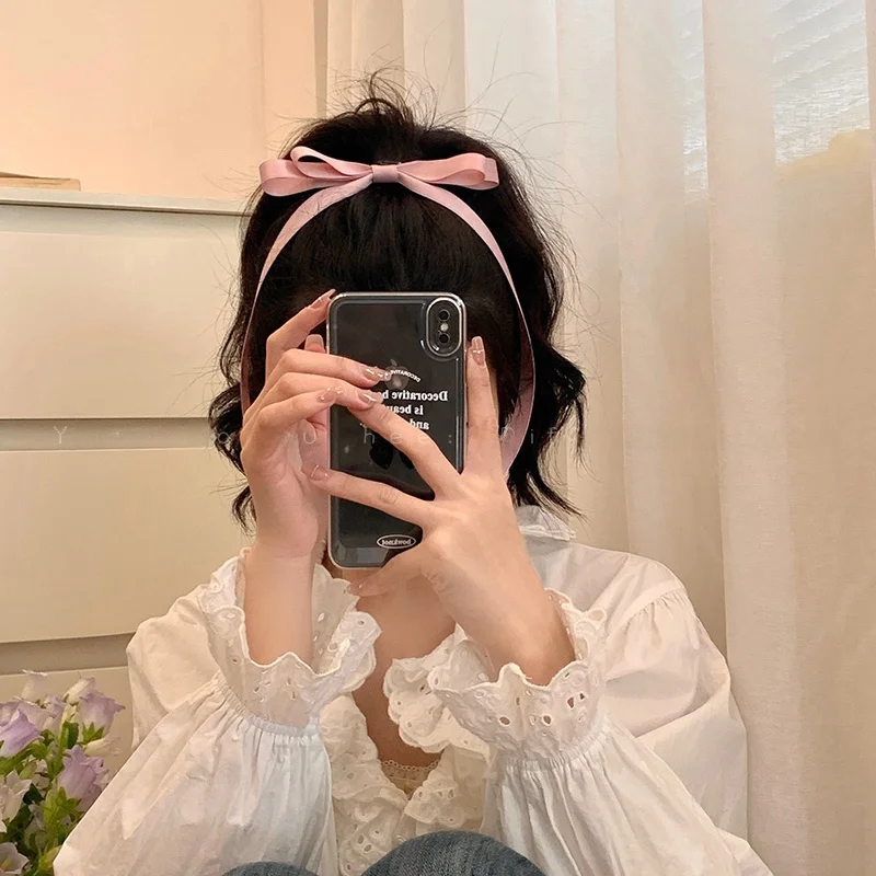 可愛いピンクリボン蝶結びのヘアクリップ：リボン留め具のデザインと実用性を解説