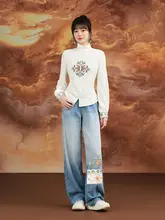 民族風刺繍が施された冬用フリース入りストレートデニムパンツ