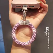 カラフルなビジューとリボンデザインのスマホ用ハンドストラップ【指環付き・高級感ある仕上げ・キーリングとしても使用可能】