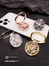 多機能指輪スタンド【デスク用・回転式・スマートフォン全機種対応・便利な貼り付けタイプ】