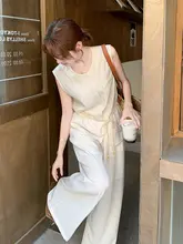 洗練された通勤スタイル！白色ノースリーブトップスとワイドパンツ【高級感・エレガント】（セットアップ対応）