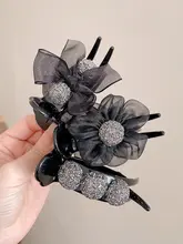 リボンデザインのヘアクリップ【後頭部用・丸みのある形・髪飾り】