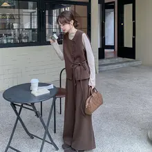春季の高級感ある女性用ベスト重ね着トップスとワイドパンツのコーディネート（セットアップ対応）