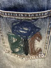 レトロ風デザインのユニセックスデニムパンツ【ヒップホップスタイル・ワイドレッグ・ウォッシュ加工】