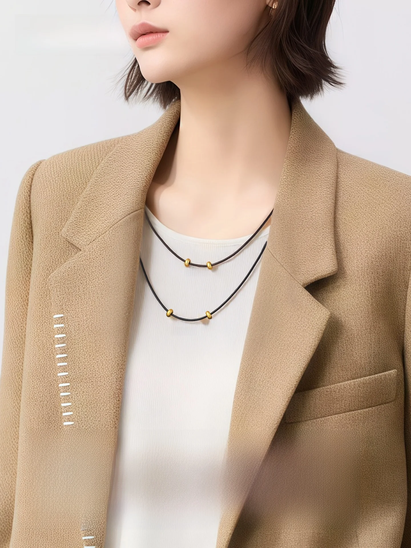 18金ネックレス レディース 人気 おすすめ：高級感漂う ブラックロープネックレス【金色の玉石付き・カジュアルデザイン】