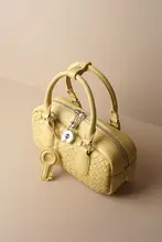 編み込み牛革製 手提げバッグ【小型・ユニークデザイン・ボウリングスタイル】