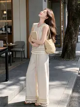 魅力的な民族風フローレスチュニックとワイドパンツ【夏のリゾートスタイル・ノースリーブ・フリンジデザイン】（セットアップ対応）