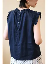 涼しさを感じる白色リネンのフレンチスタイルのフリル袖トップス（セットアップ対応）