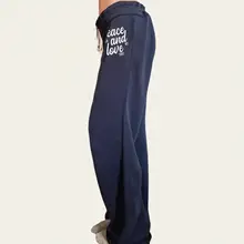 アメリカンヴィンテージ風ブルーリボン付き字母プリントニットパンツ【スポーツスタイル・ゆったりストレート】