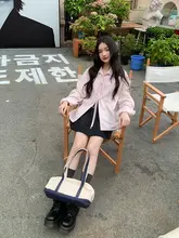 春にぴったり！ピンクのリボン付きストライプ長袖シャツ【女性用・韓国風】