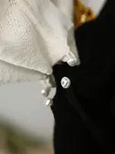 極上の柔らかさのレース編みウールニット【ドイツ製・花柄・ルーズフィット】