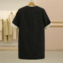 気品あるゆったりシルエットのワンピース【半袖・黒・細見え効果】