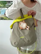 ナイロン製 防水デザイン ショルダーバッグ【カラーブロック・巾着タイプ・軽量】