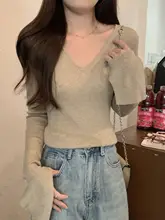 洗練されたデザイン！アシンメトリーネックフィットニットトップス【フレアスリーブ・長袖】